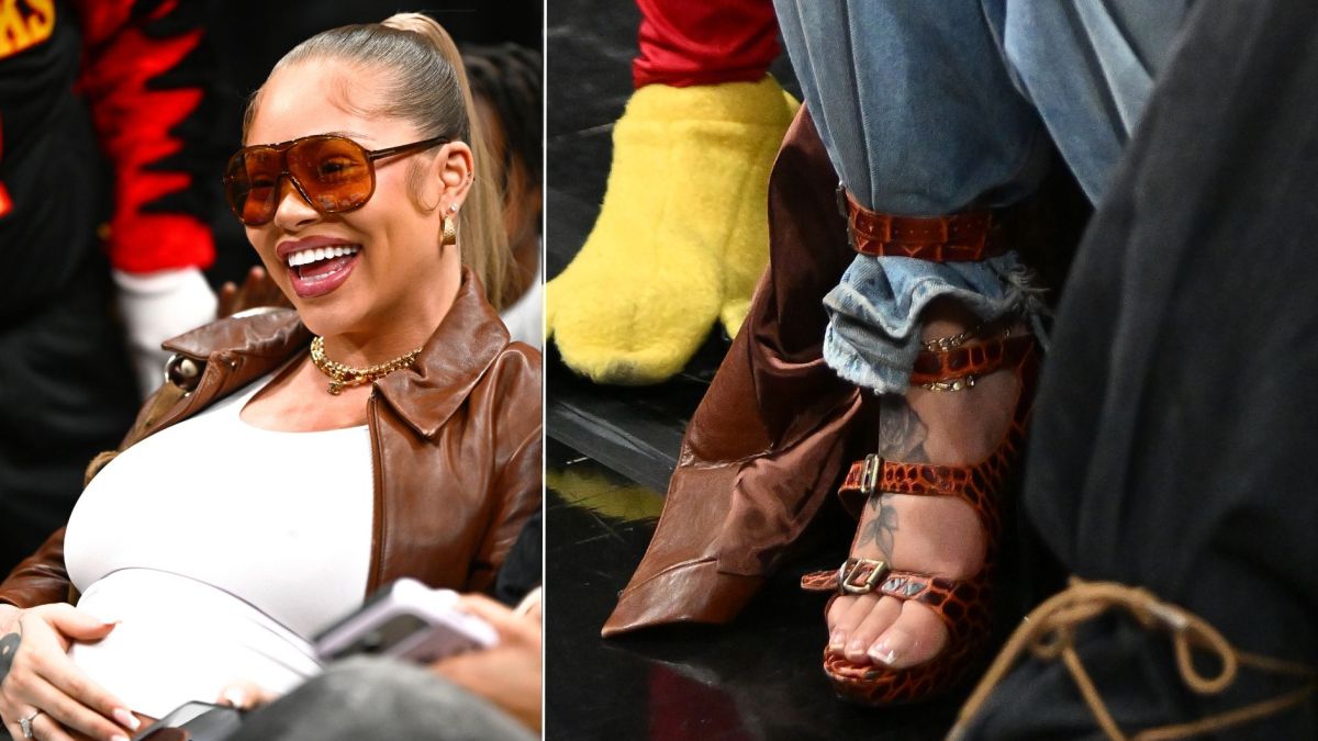 Latto wearing Vivienne Westwood buckled gladiator heels courtside at Atlanta Hawks game March 2026
