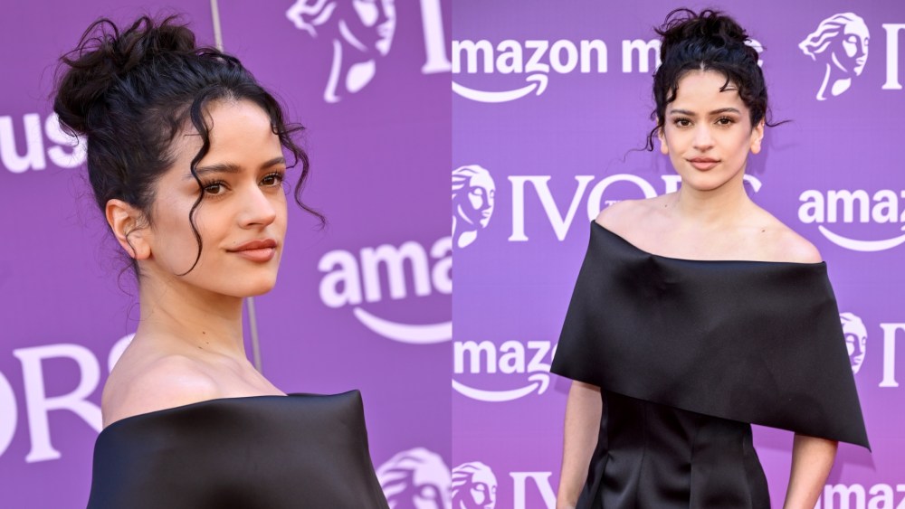 Rosalia wears a custom black Calvin Klein Collection duchess silk midi dress by Veronica Leoni at the 71st Ivor Novello Awards in London on May 21, 2026.